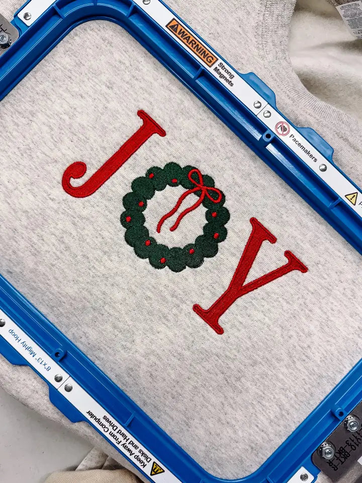 Joy Wreath Embroidered Crewneck