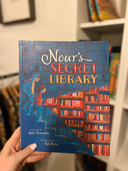 Nour's Secret Library Paperback